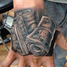 The road to riches tattoo is a symbol of the hardship and adversity overcome to get to your financial. Money Tattoos Meanings And Design Inkdoneright Com Hand Tattoos For Guys Dollar Tattoo Money Tattoo