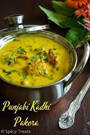 Spicy Treats Punjabi Kadhi Pakora Punjabi Kadhi With Pakora Punjabi Recipes North Indian Recipes Indian Food Recipes Vegetarian Punjabi Food