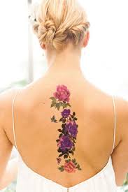 The man with the rose garland tattoo. 50 Gorgeous Flower Tattoo Designs For Women You Must See
