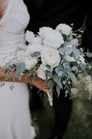 Bark.com has been visited by 10k+ users in the past month Gallery White Garden Roses White Ranunuclus Dusty Miller Eucalyptus Bridal Bouquet Deer Pearl Flowers