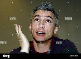 Great Britain's Jonathan Edwards announces his retirement from competition  at a press conference in Paris, Friday August 22, 2003. The 37-year-old  Olympic and world triple jump champion has finally decided to call