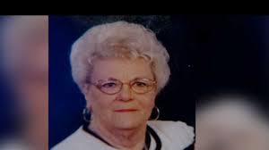 76-year-old woman killed in shootout; 1 possible suspect wounded