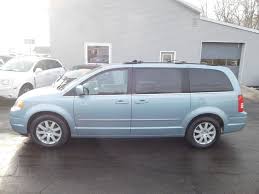 Image result for Light Ice Blue 2009 Town Car