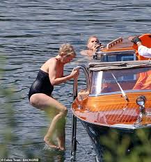 Sorry for the not so good quality. Gary Barlow 49 And Wife Dawn Andrews 50 Enjoy A Swim During Lake Como Trip
