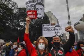 Calls to impeach bolsonaro are rising, but his grip on brazil remains strong. As Brazil Tops 500 000 Deaths Protests Against President
