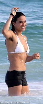 It's normal to have armpit hair at 13. Michelle Rodriguez Flashes Her Armpit Hair On The Beach In Mexico Daily Mail Online