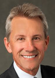 The chairman of **Amos Media**, Rick Amos (below), blames the lack of  printed copies of *Scott Stamp Monthly*