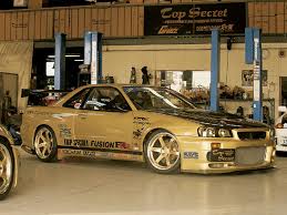 These cars were powered by a range of naturally aspirated or turbocharged inline six engines, ranging from 2.0l to 2.6l in displacement. Top Secret Nissan R34 Skyline Gold Member