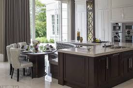 The Kitchen Is Fitted Out With Top Of The Range Modern Appliances And Has A Built In Island A Kitchen Island With Seating Kitchen Seating Modern Kitchen Tables
