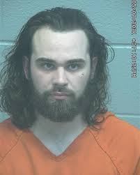 Man arrested for shooting at family in south Midland