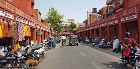 Vibrant traditional storefronts lining Bapu Bazar, AI generated