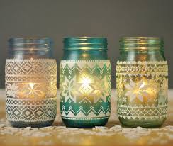 14 Creative Ways To Decorate With Mason Jars For The Holidays Mason Jar Decorations Mason Jar Lanterns Christmas Mason Jars