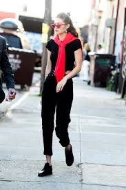 Her black pair of biker shorts styled with a simple white tee and a denim jacket thrown over. Gigi Hadid Street Style Summer 2017 Popsugar Fashion