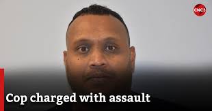 A police officer attached to the Valencia Police Post has been charged with  assault. https://www.cnc3.co.tt/cop-charged-with-assault/