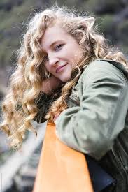 Worn by 'it girls' like kylie jenner and rita ora, cornrows are definitely one of the most popular cool hairstyles for girls this year. Teen Girl With Long Curly Hair Looking At Camera By Jacqui Miller