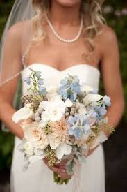 Say yes to this beautiful wedding bouquet set if you need your bridal flowers delivered fast! Beach Chic Light Blue And Peach Wedding Every Last Detail Blue Wedding Bouquet Gorgeous Wedding Bouquet Blue Peach Wedding