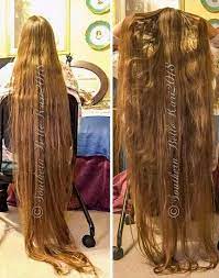 rapunzel sits and fluffs her hair lange haare frisuren langhaar haare