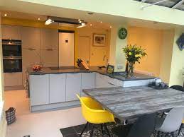 Maybe you would like to learn more about one of these? Large L Shaped Island With Integrated Family Dining Table Contemporary Kitchen Buckinghamshire By Lima Kitchens Houzz Uk