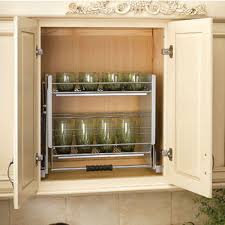 Cabinets provide a functional and fashionable cabinets provide a functional and fashionable way to store food, dinnerware, equipment, and other cooking necessities. Rev A Shelf Premiere Pull Down Shelving System For Kitchen Wall Cabinet Kitchensource Com