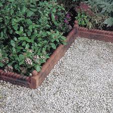 Lining your gravel path with larger stones, pavers, or brick edging will also keep your gravel contained. Garden Edging Rustic Rope Top Bradstone Concrete Engineered Stone
