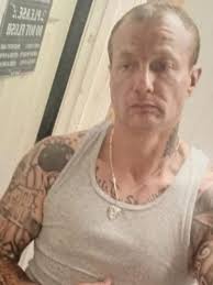 Man armed with machete accused of assaulting woman at massage parlor