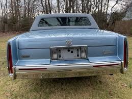 Image result for Black Sapphire 1993 Cadillac