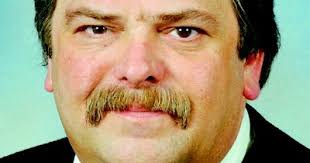 Associate Editor Dick dies at 60