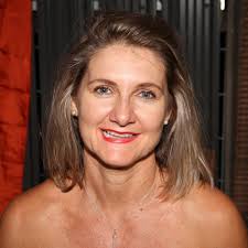 Just moved into a new house and am baffled at what to do with this  “opening” between the kitchen and the family room. Ideas? The wall is  weight bearing!!