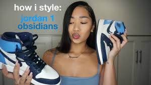 Inspired by the team colors of michael jordan's north carolina tar heels, this air jordan 1 is constructed of a premium leather all throughout the upper and combines sail, obsidian, and university. How I Style Air Jordan 1 Obsidians Unc Youtube