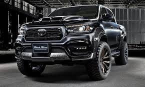 Japanese Tuner Wald International Has Released Details On Its Black Bison Body Kit For The Toyota Hilux Handing The Ba Toyota Hilux Used Toyota Camry Toyota