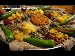 Ethiopian Food Beyeyanetu A Vegan Platter Of Food On Injera Miser Gomen Wot Enjera Sinig Ethiopian Food Vegan Ethiopian Recipes Recipes