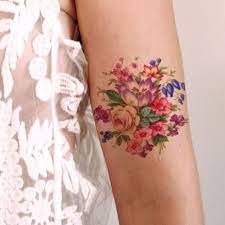 Who Doesn T Love Flowers Dainty Tattoos Tattoos Flower Tattoo Designs