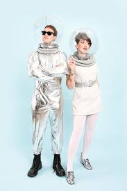 Brunette Young Woman And Man With Short Brown Hair And Dark Sunglasses Dressed Like Retr Couple Halloween Couple Halloween Costumes Halloween Costumes Women