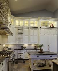 I Like The Flagstone And Lit Upper Cabinets Home Kitchens Kitchen Design Home