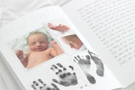 5 Tips For Documenting Baby S First Year Baby Photo Books Baby Books Diy Baby Milestone Book