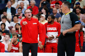 Micheal (bottom right) with his team canada basketball team, after their win at summer games. Canadian Men Will Play Olympic Basketball Qualifying Tournament In Victoria Ctv News