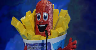 The format is that celebrities perform anonymously in costumes and are unmasked if they lose. Masked Singer Uk Sausage Makes Last Minute Change To Their Outfit