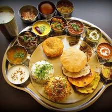 Indian Dinner Birthday Party Food List In India Thali This Is Just Dinner In India With Various Shaaks And Breads Indian Food Rajasthani Food Indian Food Recipes Desi Food