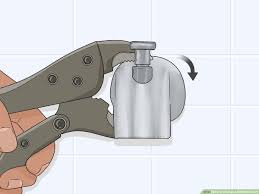 How to unclog water heater that will not drain connect washing machine hose to drain valve, and then connect garden hose to flush debris out of way. How To Change A Bathtub Faucet 14 Steps Wikihow