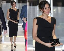 Meghan Markle In Black Halo S Popular Jackie O Dress Red Carpet Fashion Awards Dresses Fashion Black Halo