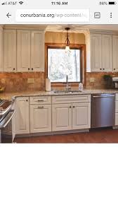 Pin By Barb Martinie On Wood Trim And White Cabinets White Kitchen Oak Trim Kitchen Cabinet Remodel Kitchen Cabinets