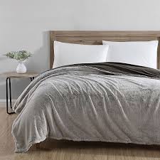 American raccoon dancer style blankets. Ugg Pinecreek Faux Fur Blanket In Chocolate Bed Bath Beyond