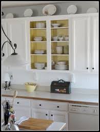 Small southwest galley brick floor and wood ceiling kitchen photo in phoenix with an undermount sink, shaker cabinets, dark wood cabinets, quartz countertops, multicolored backsplash, cement tile backsplash, stainless steel appliances, an island and beige countertops Dsc00711opencabinet Southern Hospitality Inside Kitchen Cabinets Vintage Kitchen Cabinets Painted Redo Kitchen Cabinets
