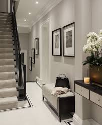 White hallway with black doors. Pin By Debbie On A Design Hall Decor Hallway Designs Hallway Inspiration