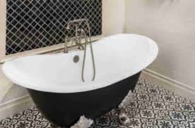 White bathroom floor tiles with small black insets can effectively ground the floor space, keeping it distinct from white walls. Bathroom Tile Ideas The Tile Shop