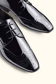 Shoes are so much more than a covering for a foot. Moss London Hatchon Patent Brogue Dress Shoe