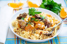 Serve the meat with the couscous stuffing decorated with these dates. A Plate With Delicious Looking Cous Cous With Lamb Meat Apricots Almonds Raisins Dates Cinnamon And Mint Stock Photo Picture And Royalty Free Image Image 10254100