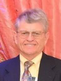 John E. Beggs Obituary