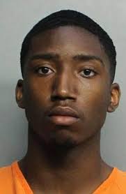 Miami spring breaker, 30, charged with starting a RIOT as over 1,000  partiers arrested