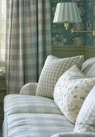 Lovely Checked Sofa With Embroidered Cushion Decor Interior Decorating Styles Interior In this attic sanctuary designed by mally skok, the vibrant and to make it feel more cohesive, match your curtains to a lamp and other accents. interior decorating